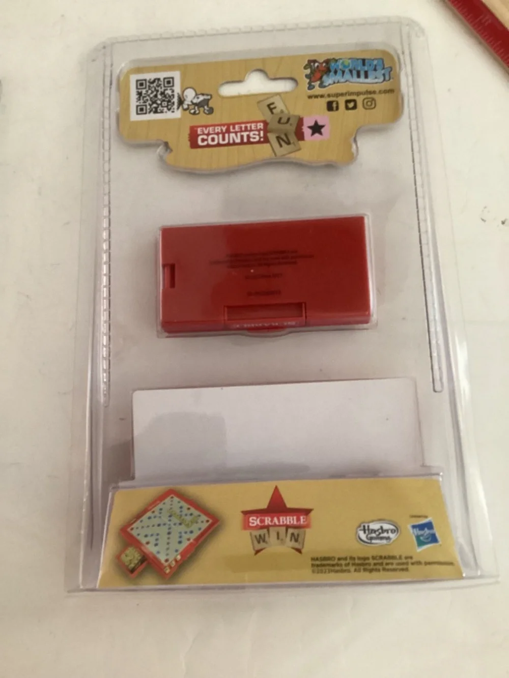 Set of 2 Worlds Smallest Classic Games: Scrabble & Connect Four